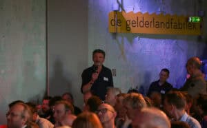 Guido Van Dijk op het Lowtech-festival van DNA in de bouw en Kennisinstituut KERN. Vaart maken met energiezuinig en betaalbaar passief bouwen en EnerPHit-renovatie